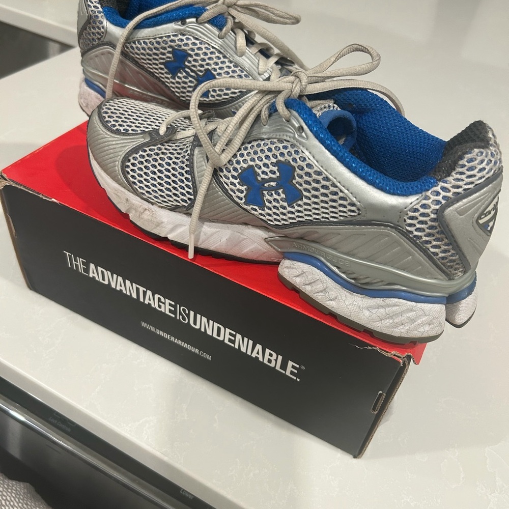 Woman’s Under Armour Gray and Blue Athletic Shoes